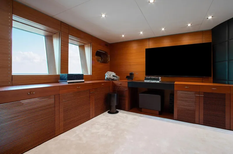 Matrix Yacht Photos Pics Luxurious interior of 1999 Baglietto 41M yacht with wood paneling and modern decor.