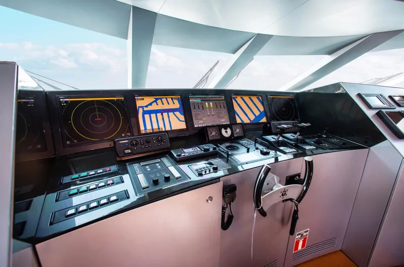 Matrix Yacht Photos Pics Control panel of 1999 Baglietto 41M yacht with navigation screens and instruments.