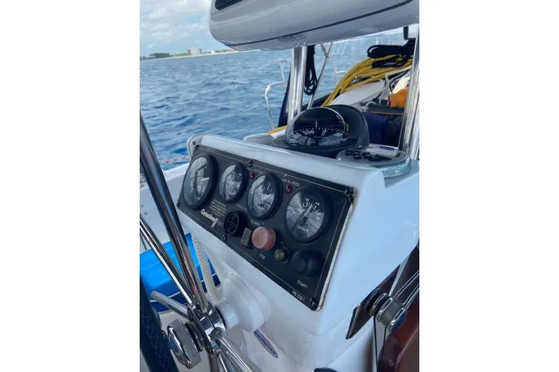 Perfect Timing Yacht Photos Pics Cockpit of a 2011 Catalina 355 sailboat with navigation instruments and compass.