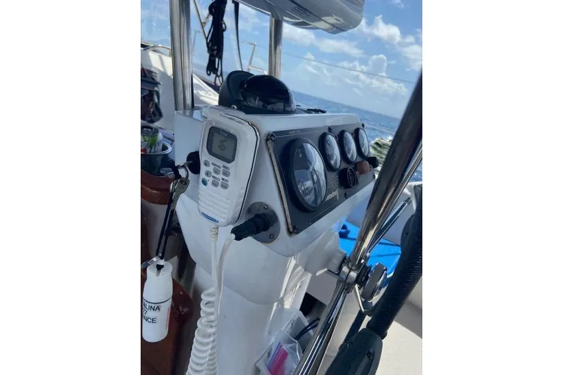 Perfect Timing Yacht Photos Pics Cockpit of 2011 Catalina 355 sailboat with navigation instruments and ocean view.