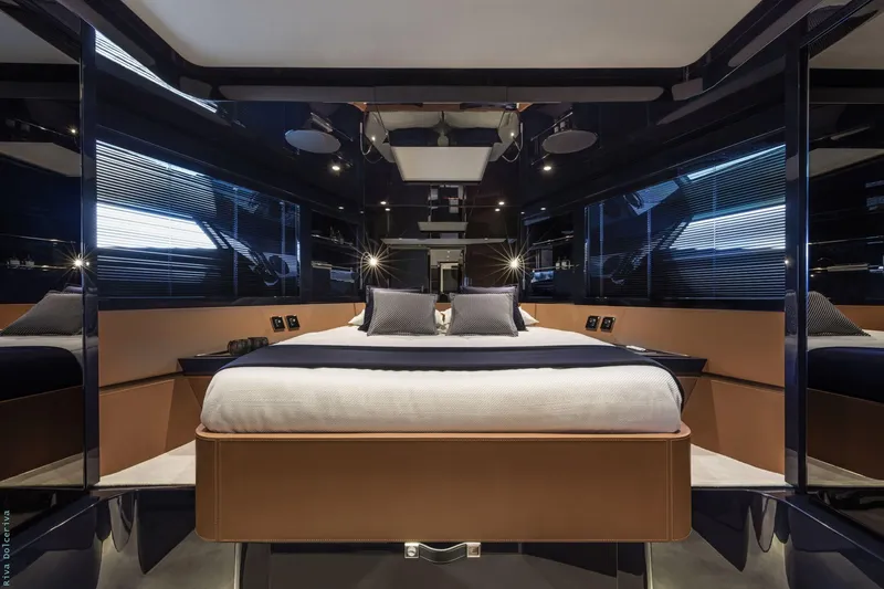  Yacht Photos Pics Luxurious interior of 2021 Riva Dolceriva yacht with elegant bedding and modern design.
