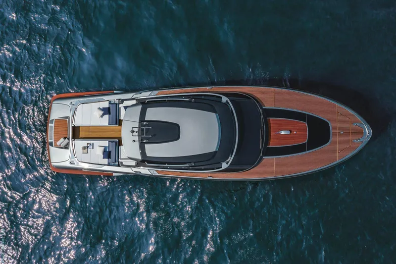  Yacht Photos Pics Overhead view of 2021 Riva Dolceriva yacht on blue water.