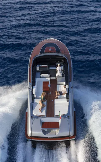  Yacht Photos Pics 2021 Riva Dolceriva luxury yacht cruising on open water, aerial view.