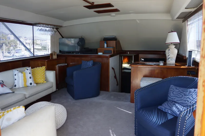 The Dog House Yacht Photos Pics Luxurious interior of 1988 Ocean Yachts Super Sport with elegant seating and decor.