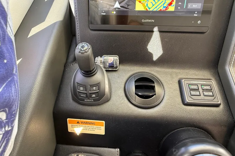  Yacht Photos Pics Control panel of 2021 Riviera 395 SUV with joystick and Garmin display.