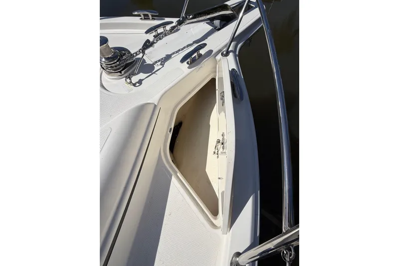  Yacht Photos Pics 2021 Riviera 395 SUV boat deck with open storage compartment.