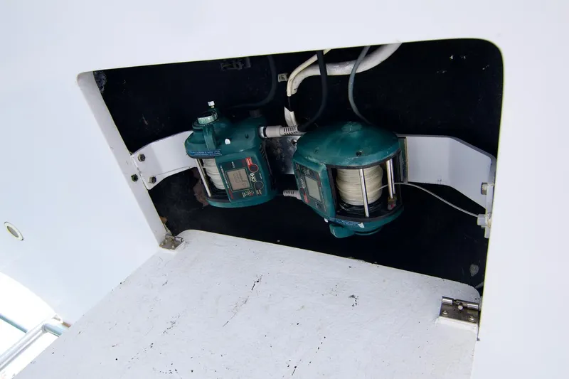 Grape Escape Yacht Photos Pics Fishing reels on a 2000 Hatteras 60 Convertible boat.