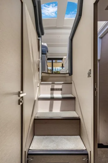 Lucky One Yacht Photos Pics Companionway stairs facing aft to salon