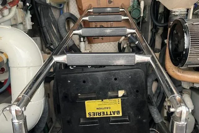  Yacht Photos Pics Engine room of 2003 Sea Ray Sundancer 460 with ladder and battery compartment.