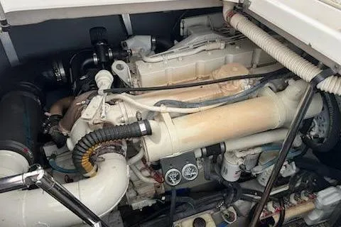  Yacht Photos Pics Engine compartment of a 2003 Sea Ray Sundancer 460 yacht, showcasing mechanical components.