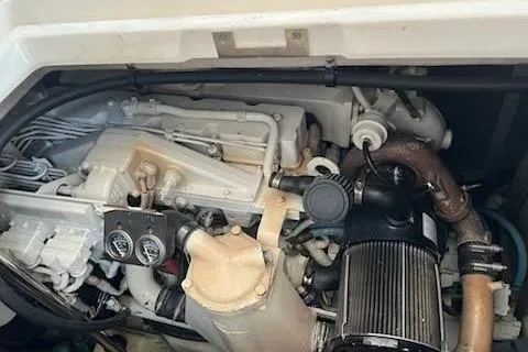  Yacht Photos Pics Engine compartment of a 2003 Sea Ray Sundancer 460 boat, showcasing mechanical components.