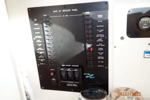  Yacht Photos Pics Main DC breaker panel on 2003 Sea Ray Sundancer 460 yacht, showing switches and controls.