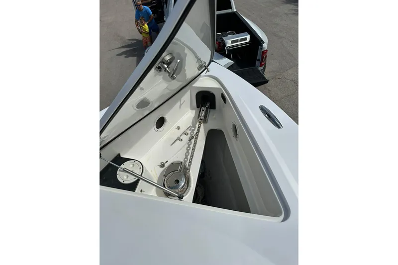  Yacht Photos Pics 2015 Nor-Tech 390 Sport Center Console anchor compartment with open hatch.