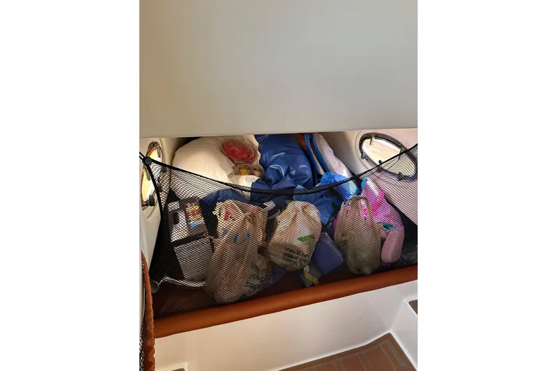  Yacht Photos Pics Interior storage area of 2015 Nor-Tech 390 Sport Center Console boat.