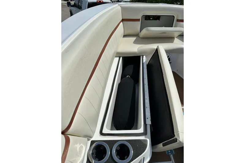  Yacht Photos Pics 2015 Nor-Tech 390 Sport Center Console interior with open storage compartments.