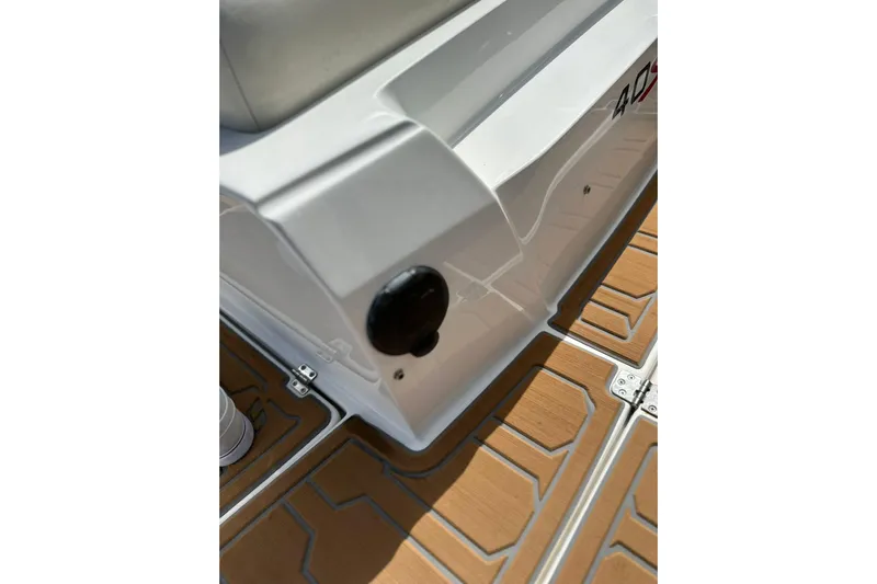  Yacht Photos Pics 2015 Nor-Tech 390 Sport Center Console interior detail with teak flooring.