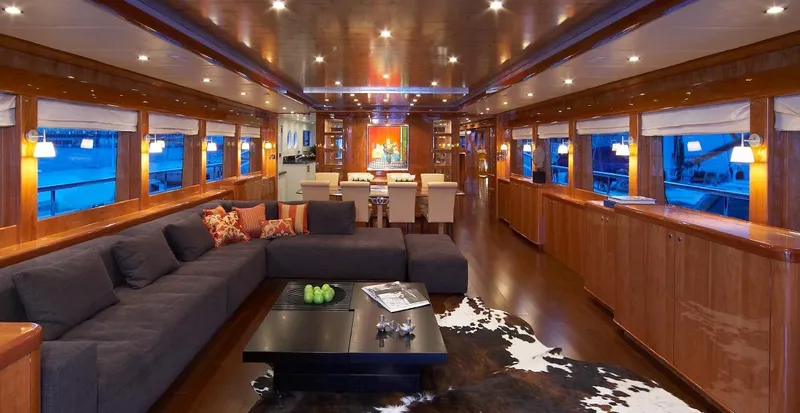 White Shark Yacht Photos Pics Luxurious interior of 2008 Johnson 105 yacht with elegant seating and dining area.