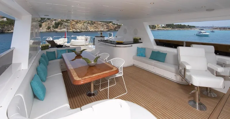 White Shark Yacht Photos Pics Luxurious 2008 Johnson 105 yacht interior with elegant seating and ocean view.