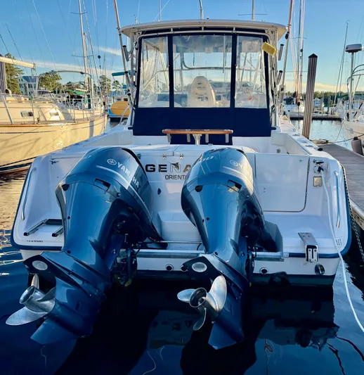 Genau II Yacht Photos Pics 2004 Grady-White Express 330 boat with Yamaha engines at the dock.
