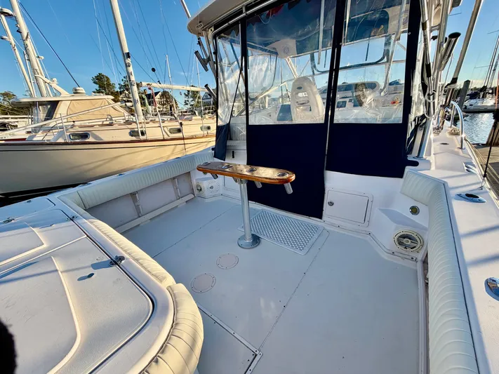 Genau II Yacht Photos Pics 2004 Grady-White Express 330 boat, spacious deck at marina.