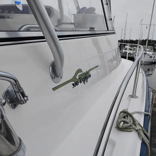 Genau II Yacht Photos Pics Grady-White Express 330 boat, 2004 model, docked at marina.