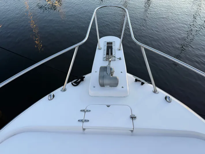 Genau II Yacht Photos Pics Bow view of Grady-White Express 330 yacht, year 2004.