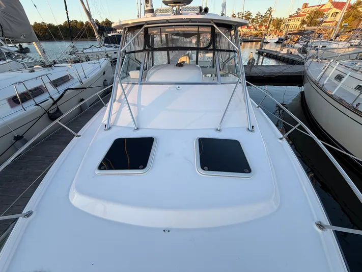 Genau II Yacht Photos Pics 2004 Grady-White Express 330 boat docked in marina.