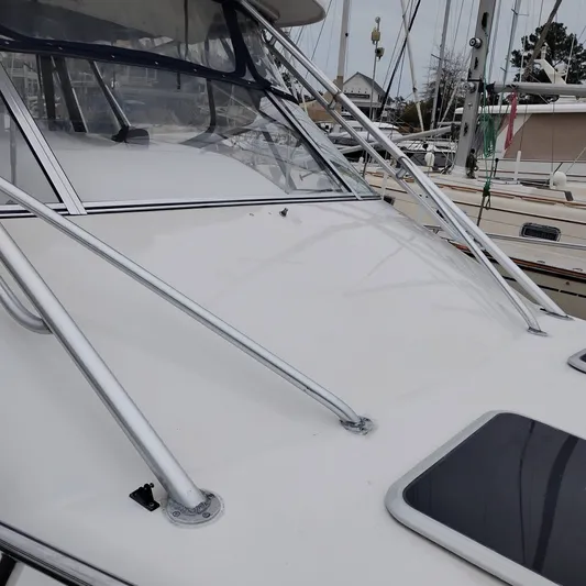 Genau II Yacht Photos Pics Grady-White Express 330 boat, 2004 model, docked at harbor.