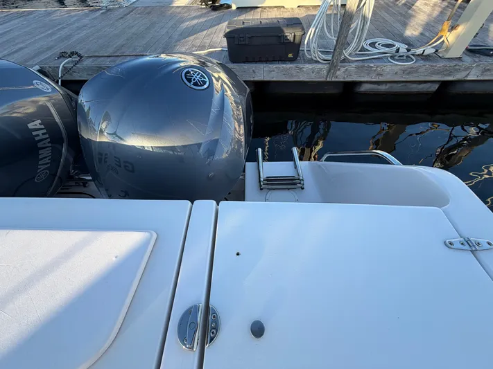 Genau II Yacht Photos Pics Grady-White Express 330 boat with Yamaha engines at dock.