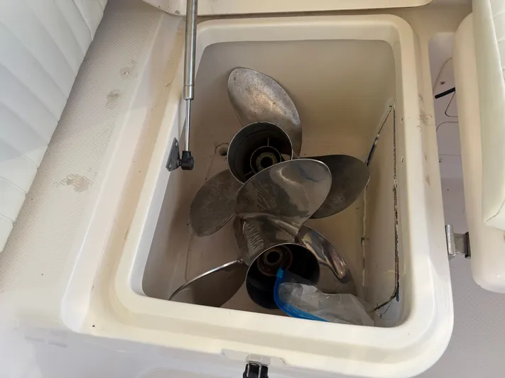 Genau II Yacht Photos Pics Boat propellers in storage compartment of a 2004 Grady-White Express 330.