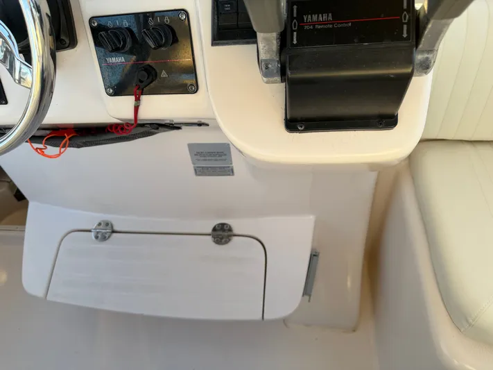 Genau II Yacht Photos Pics Control console of a 2004 Grady-White Express 330 boat.