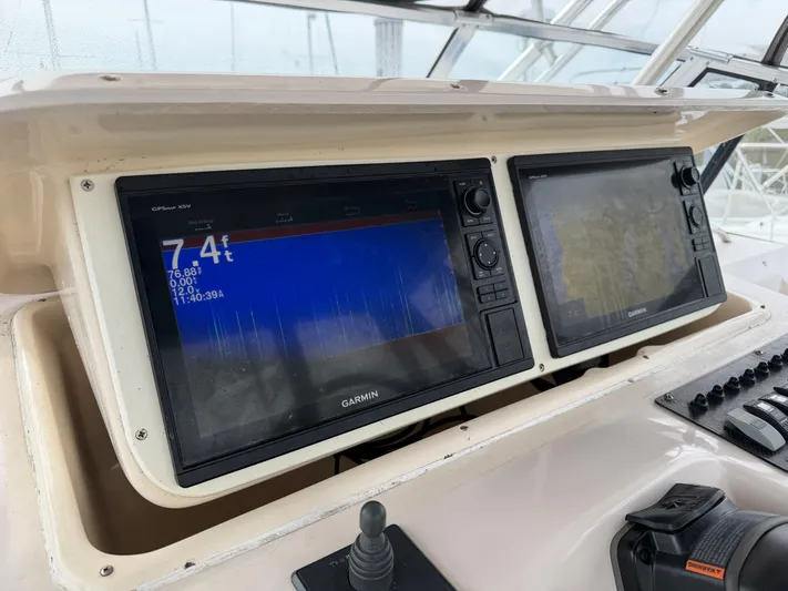 Genau II Yacht Photos Pics Garmin displays on Grady-White Express 330 boat, year 2004.