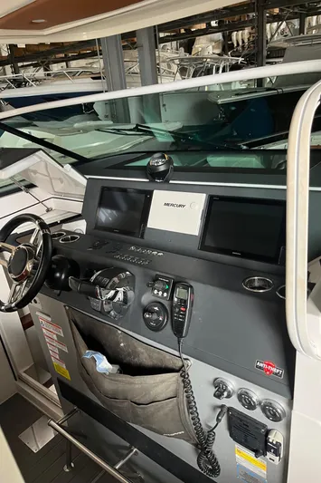 Special !! Call For Details! Yacht Photos Pics 2018 Axopar 370 SUN TOP boat dashboard with steering wheel and navigation controls.