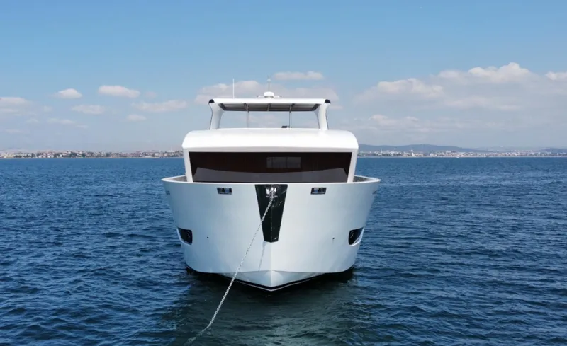  Yacht Photos Pics Front view of 2023 Carboyacht 90 luxury yacht on open water.