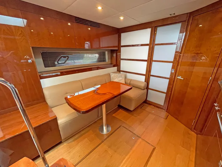  Yacht Photos Pics Luxurious interior of 2012 Sea Ray 450 Sundancer yacht with elegant wood finishes.