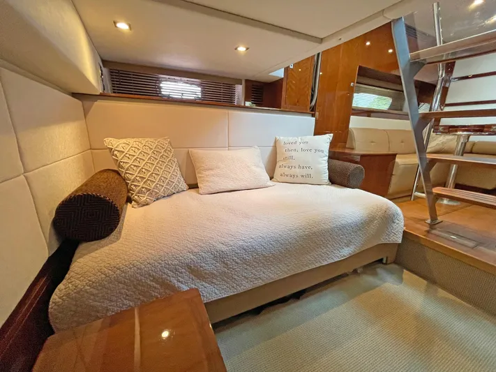  Yacht Photos Pics Luxurious interior of 2012 Sea Ray 450 Sundancer yacht with cozy seating area.