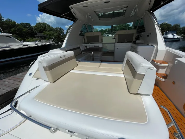  Yacht Photos Pics 2012 Sea Ray 450 Sundancer yacht with spacious deck and seating area.