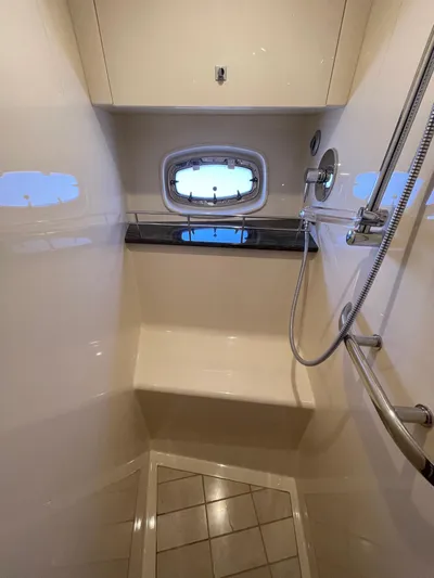  Yacht Photos Pics Luxurious shower area in 2012 Sea Ray 450 Sundancer yacht.