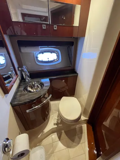  Yacht Photos Pics Luxurious bathroom in 2012 Sea Ray 450 Sundancer yacht with modern fixtures.
