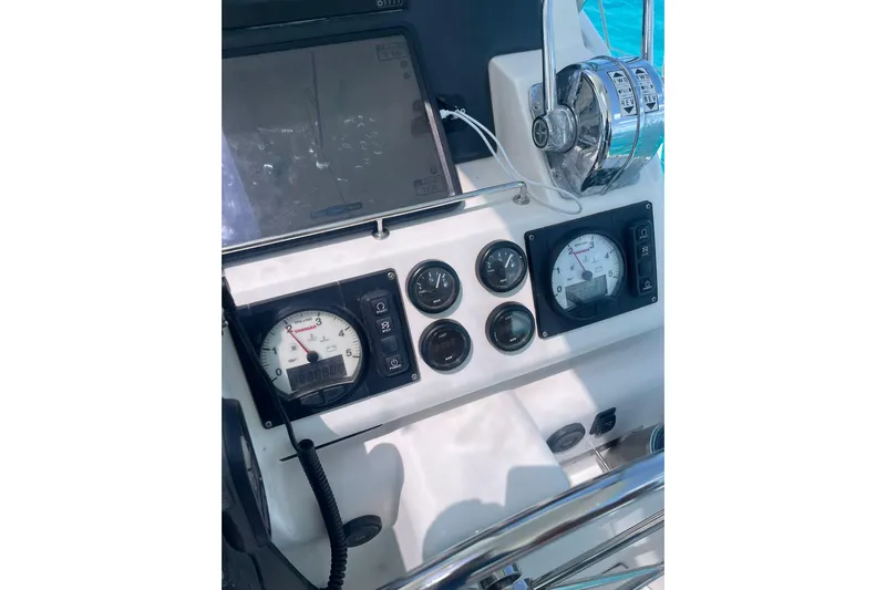 Yacht Photos Pics Control panel of a 2019 Leopard 45 yacht with gauges and navigation equipment.