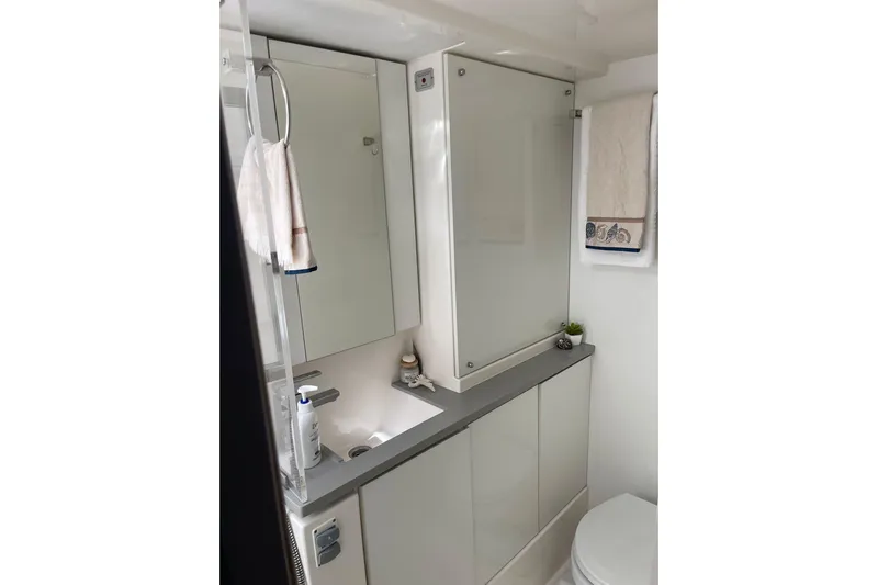  Yacht Photos Pics Modern bathroom in 2019 Leopard 45 yacht with sleek cabinetry and fixtures.