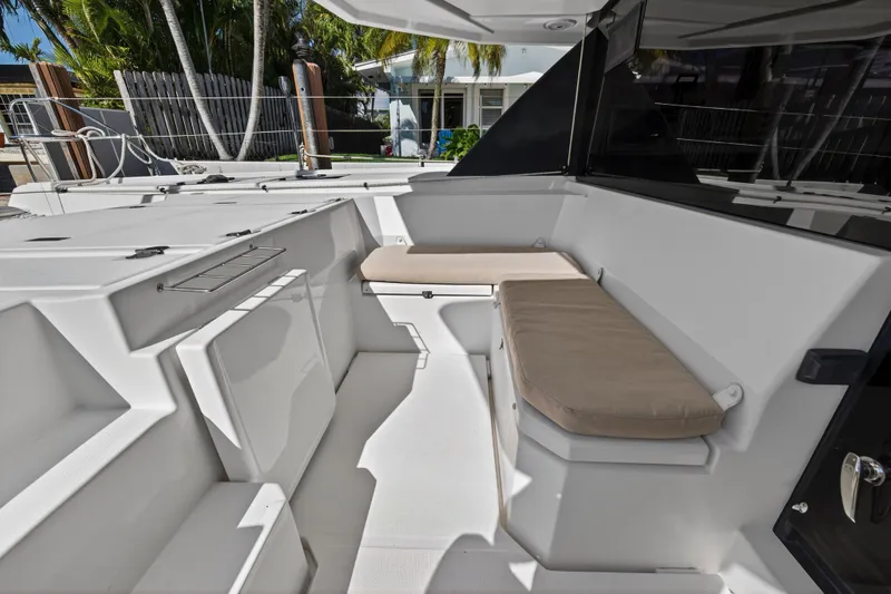  Yacht Photos Pics 2019 Leopard 45 yacht interior with cushioned seating and sleek design.