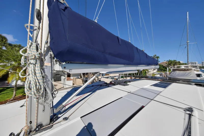  Yacht Photos Pics 2019 Leopard 45 sailboat deck with blue sail cover and rigging.