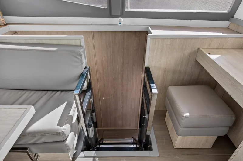  Yacht Photos Pics Interior of 2019 Leopard 45 yacht with modern seating and wooden finishes.
