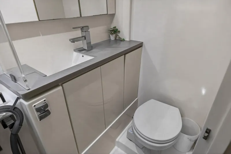  Yacht Photos Pics Modern bathroom in 2019 Leopard 45 yacht with sleek fixtures and compact design.