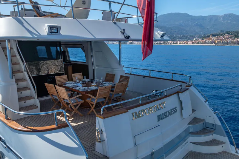  Yacht Photos Pics Luxury Falcon Yachts 86, 1999 model, with elegant outdoor dining area on deck.