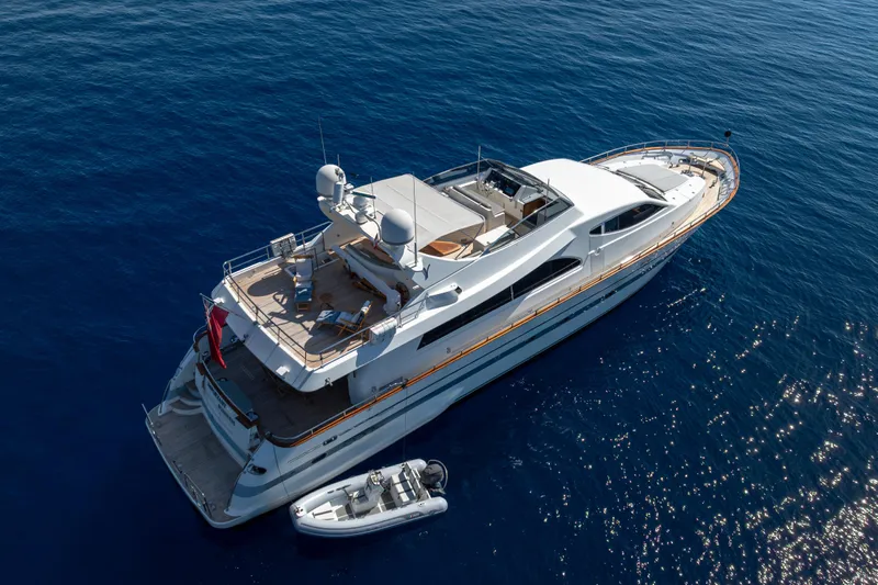  Yacht Photos Pics Aerial view of 1999 Falcon Yachts 86 luxury yacht on open sea.