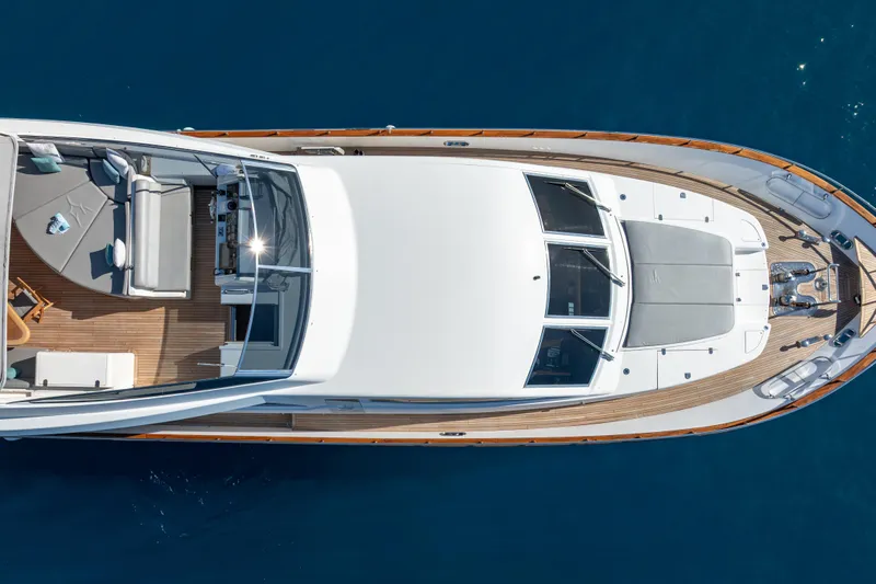  Yacht Photos Pics Overhead view of 1999 Falcon Yachts 86, showcasing sleek design and spacious deck.