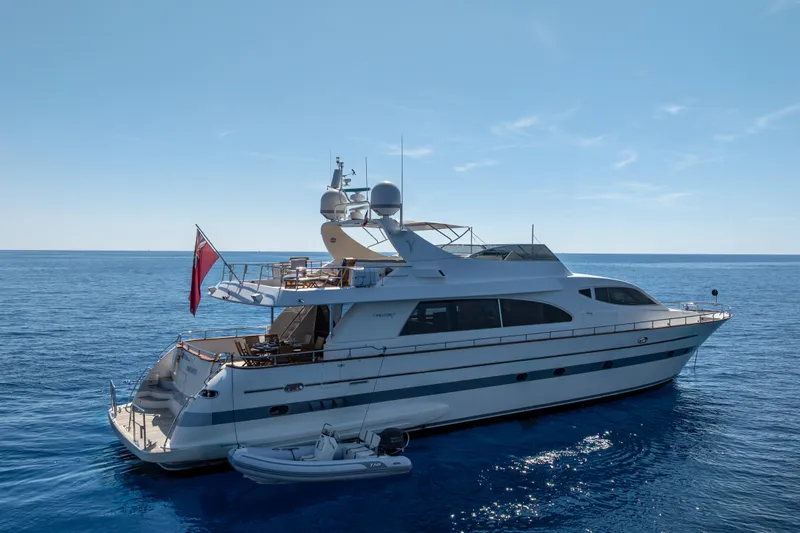  Yacht Photos Pics 1999 Falcon Yachts 86 luxury yacht on calm blue sea under clear sky.