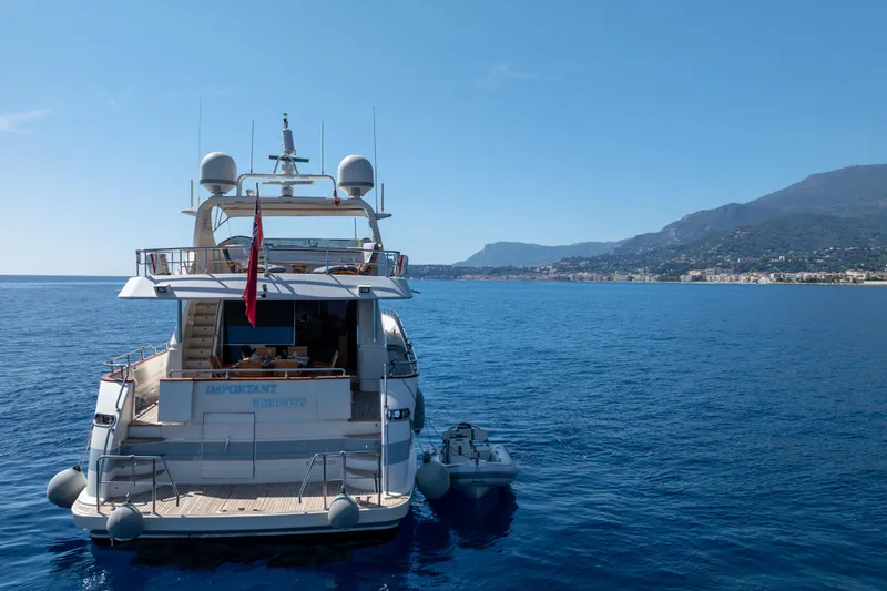  Yacht Photos Pics Falcon Yachts 86, 1999 model, anchored in scenic coastal waters.